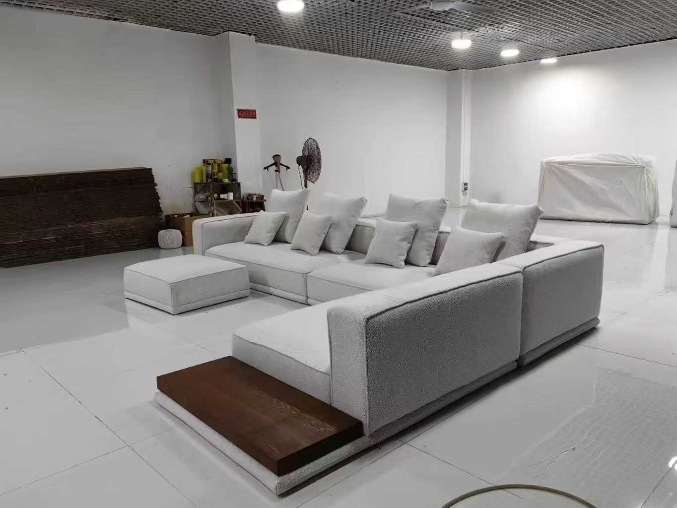 Light Gray L-Shaped Sectional Sofa with Ottoman