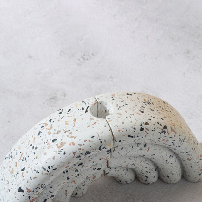 Terrazzo-patterned fan-shaped bookshelf