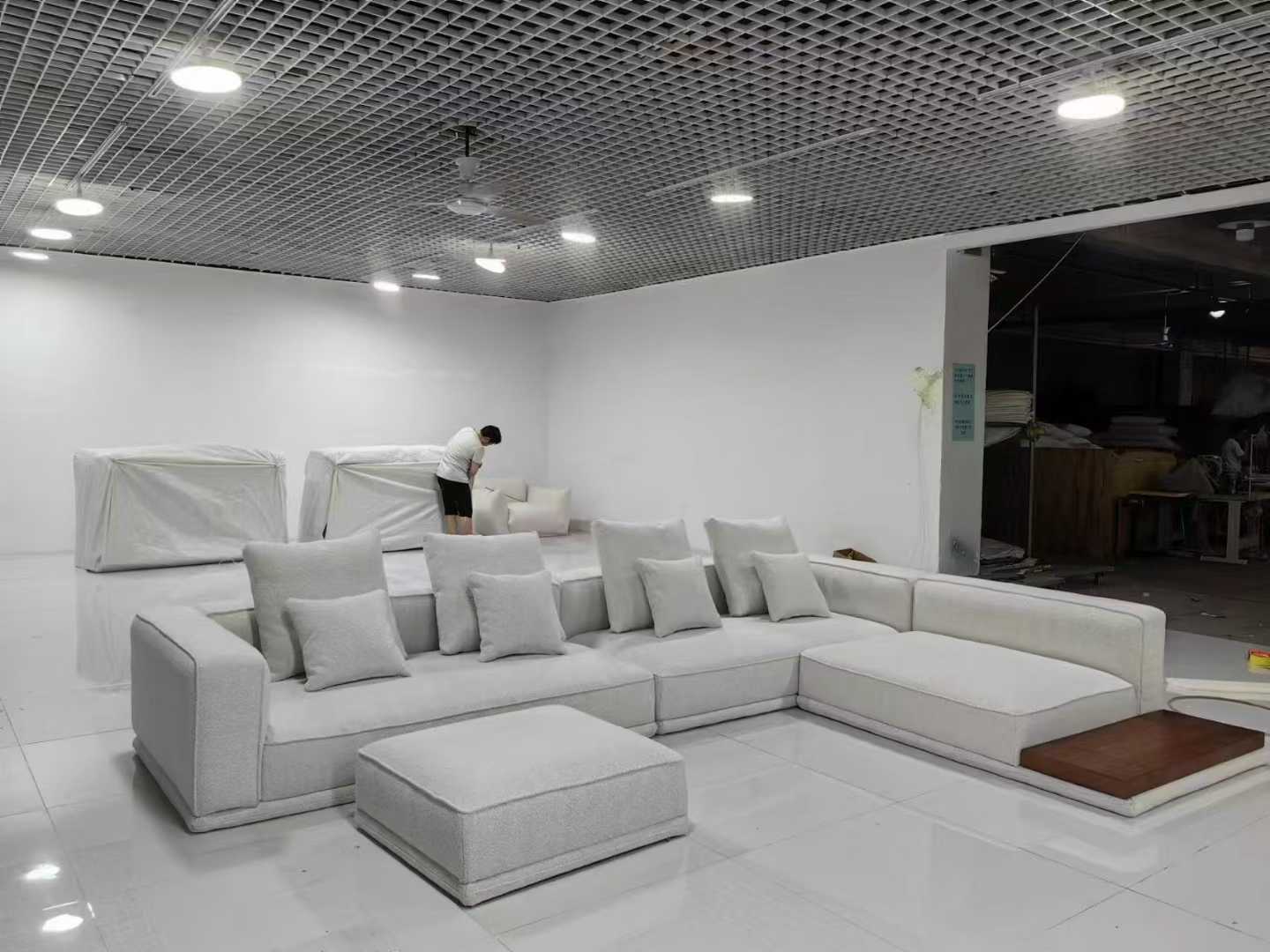 Light Gray L-Shaped Sectional Sofa with Ottoman