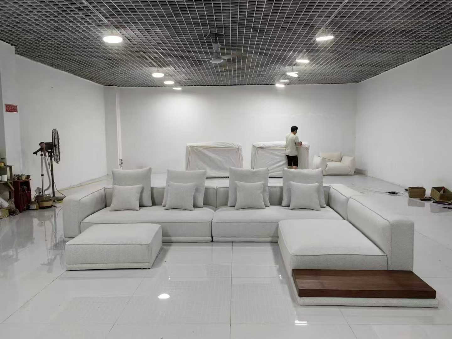 Light Gray L-Shaped Sectional Sofa with Ottoman