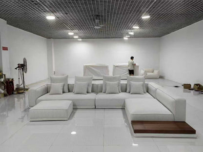 Light Gray L-Shaped Sectional Sofa with Ottoman